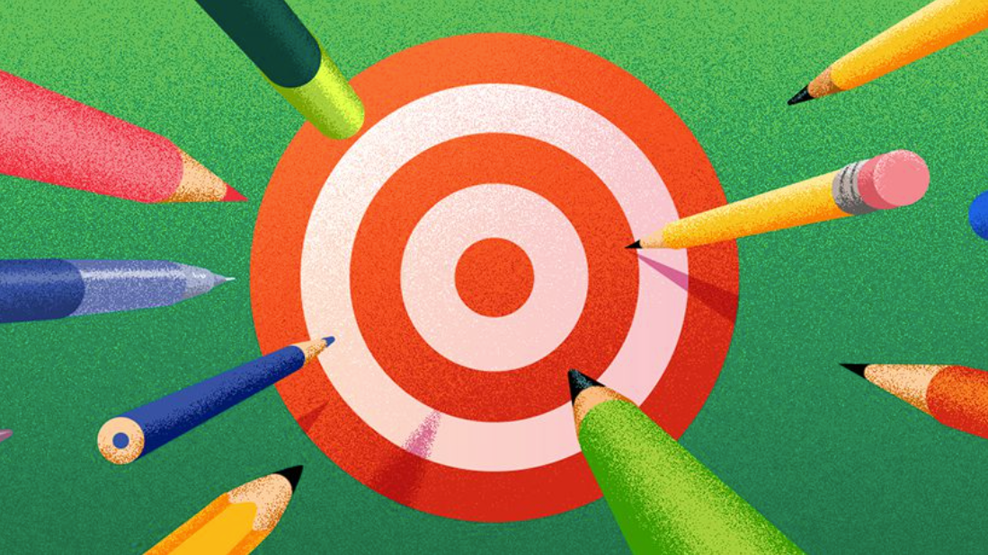 Target with pens and pencils flying through the air towards the bullseye.